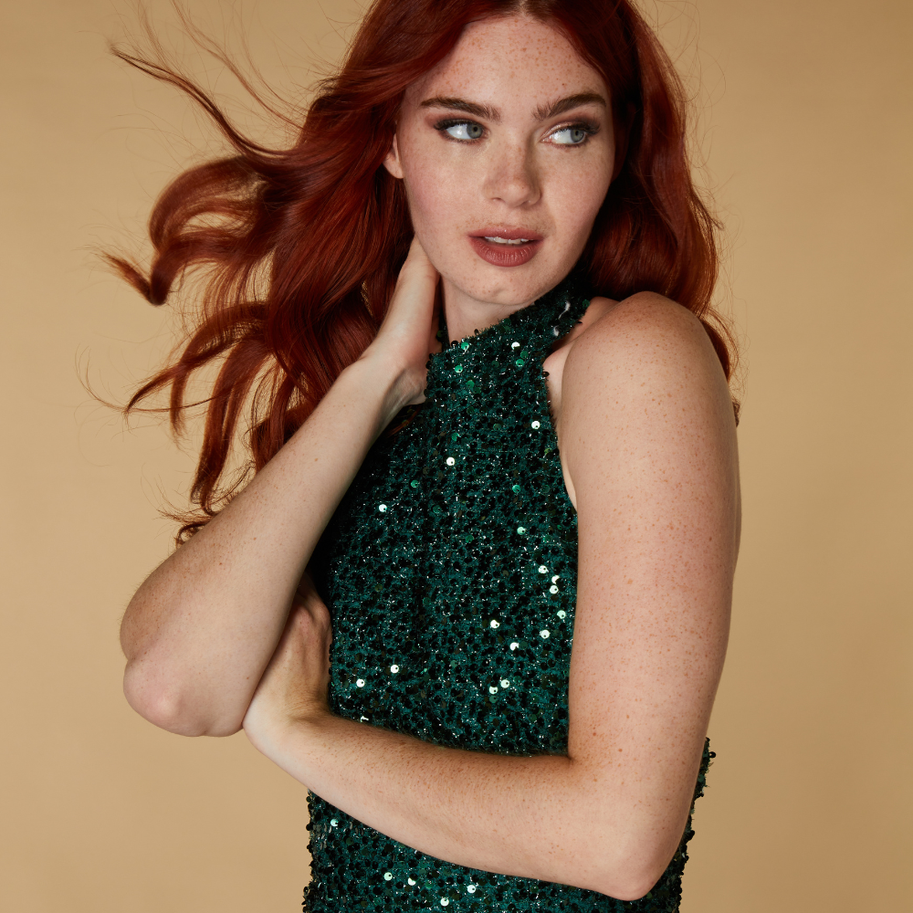 JARLO model wears green sequin Lan midi dress